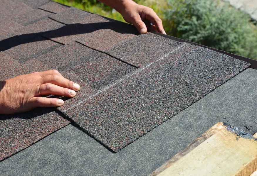 Roofing Contractor reparing Shingle Goof on Miami home